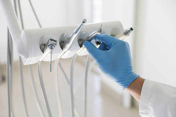 Professional Tooth Extraction technician working in Tchula, MS